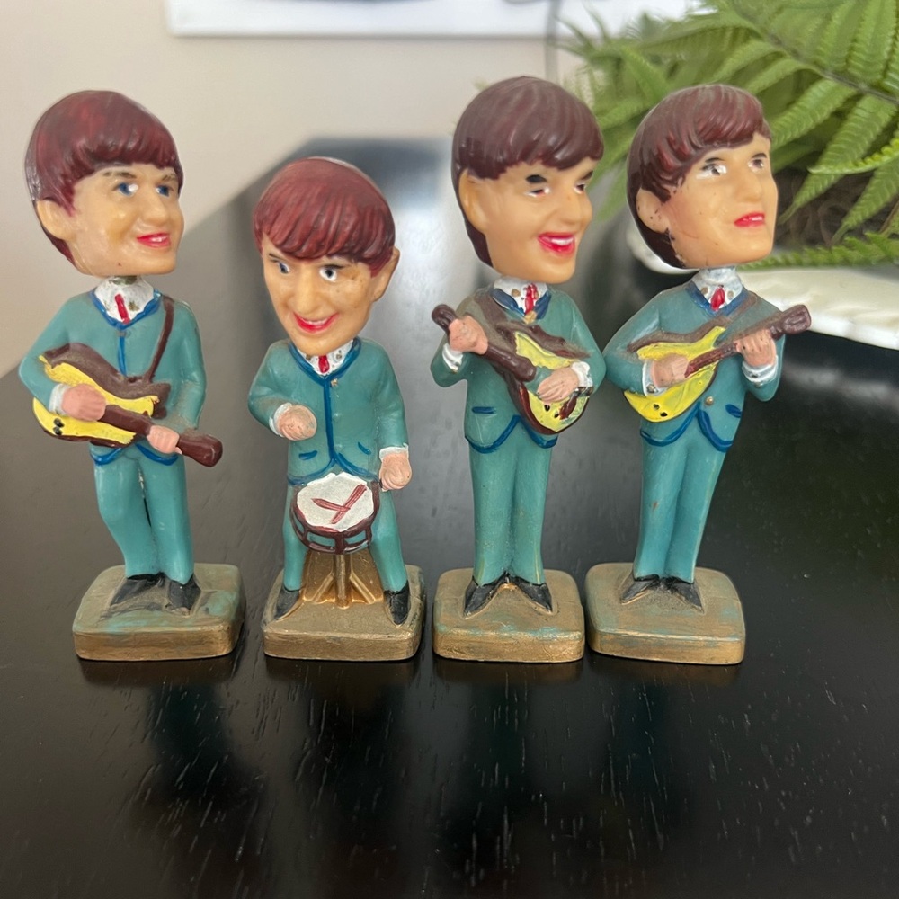 Beatles 1960s bobble head cake topper.